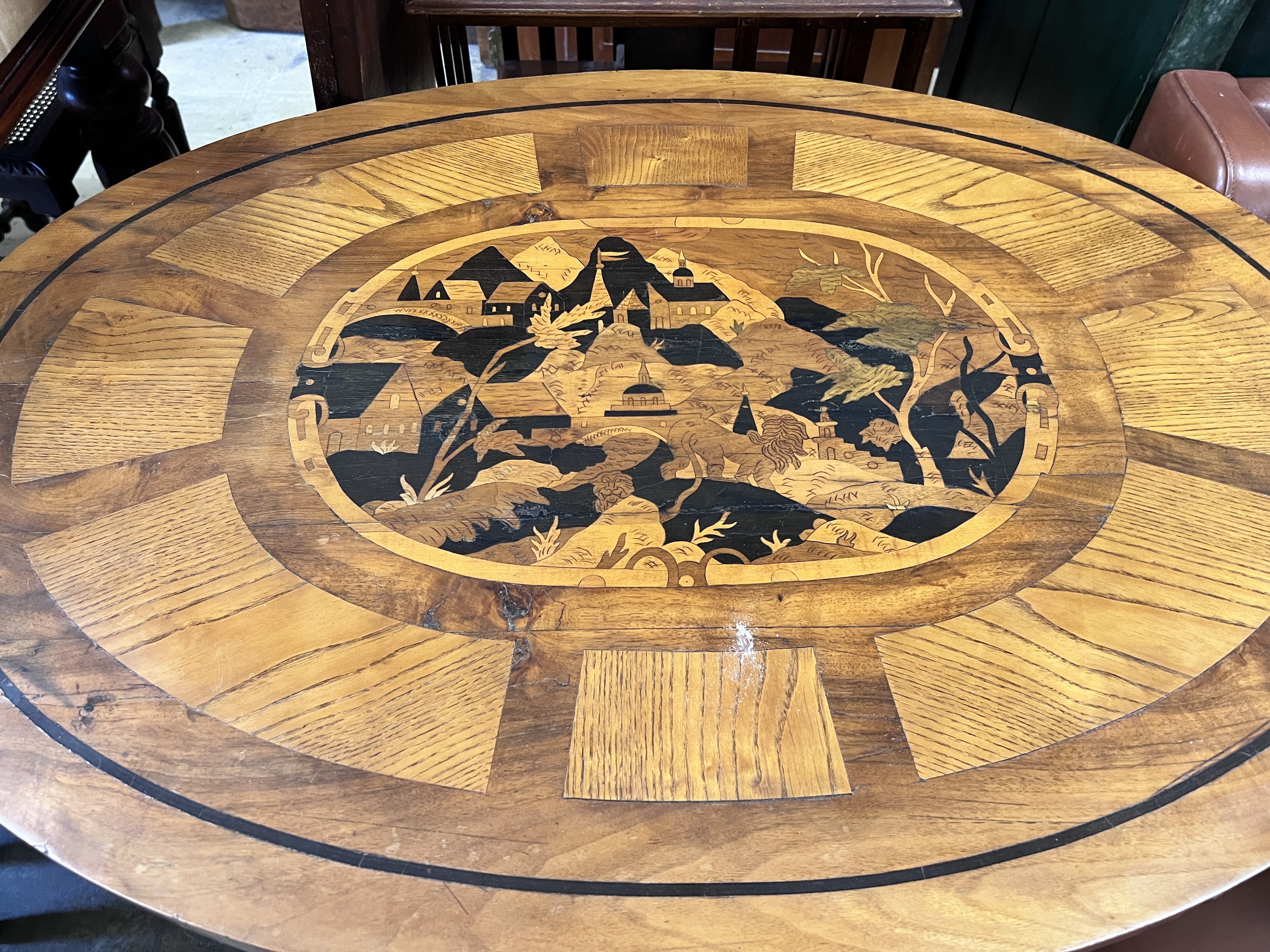 A 19th century Continental marquetry inlaid centre table with frieze drawer, width 103cm